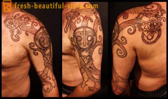 Slavic male tattoo sa kanyang braso